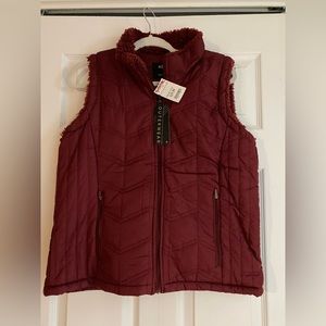 Cranberry colored fur lined, quilted vest size M. NWT